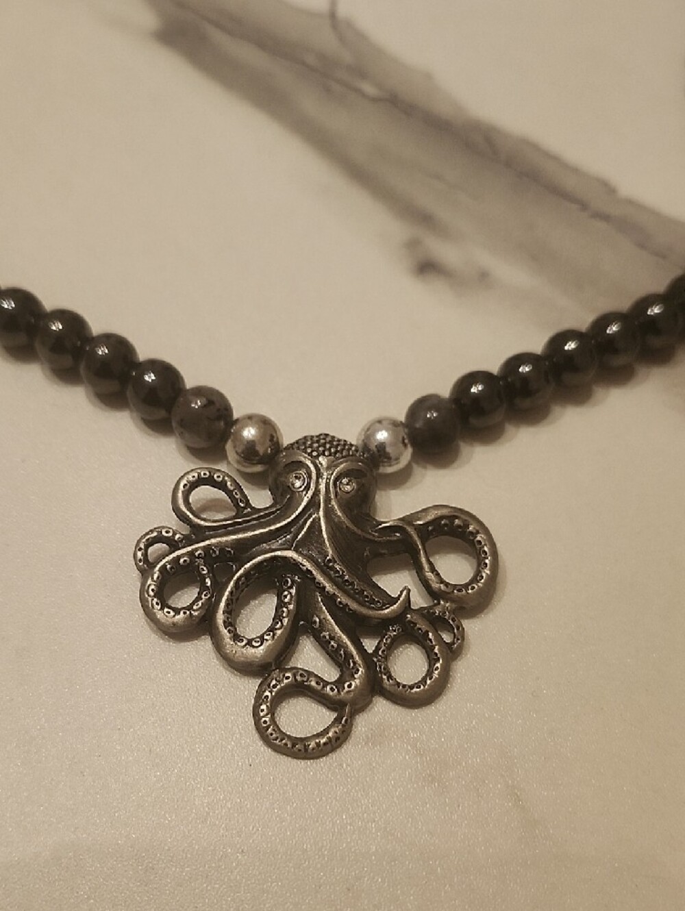 Handcrafted Tidal Guardian Hematite Beaded Necklace - Picture 6 of 6